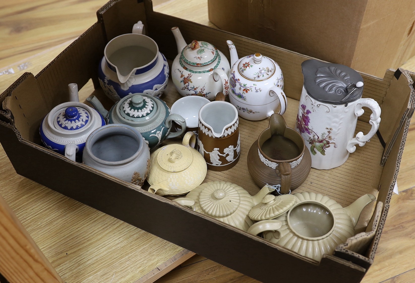 A quantity of various teapots and jugs, 19th/20th century, including Worcester and Wedgwood